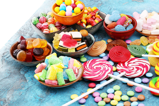 candies with jelly and sugar. colorful array of different childs - Photo, Image