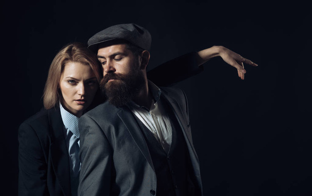 Man and woman in retro suit and hat - Foto, afbeelding
