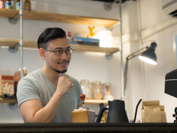Man being barista and own a small coffee shop. - 写真・画像