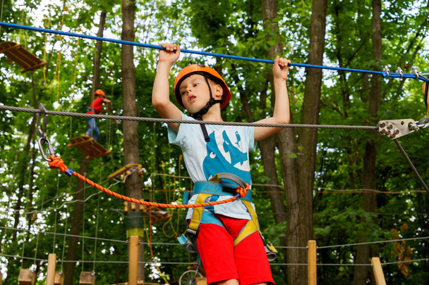 The boy climbs a rope park - Fotoğraf, Görsel