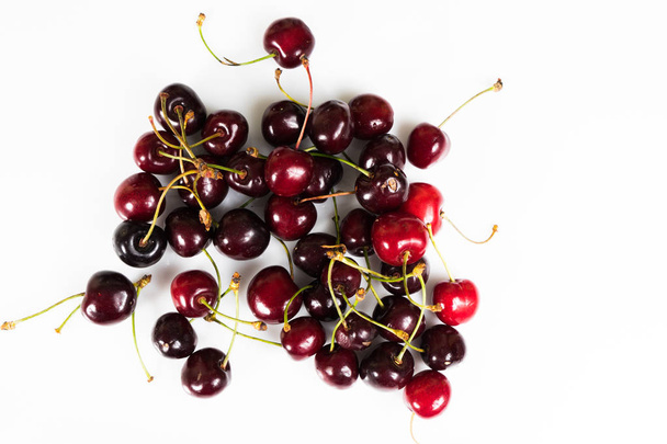 Beautiful, juicy organic cherry on a white background - Fotó, kép