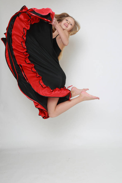 Studio image of flamenco dancer is jumping/Dancer in motion - Fotografie, Obrázek