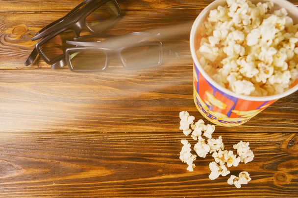 Glasses and popcorn, the concept of cinema - Photo, image