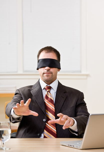 Businessman in blindfold - 写真・画像