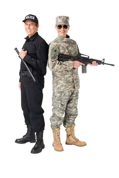 Silah ve üzerinde beyaz izole baton polisle olan genç asker - Fotoğraf, Görsel