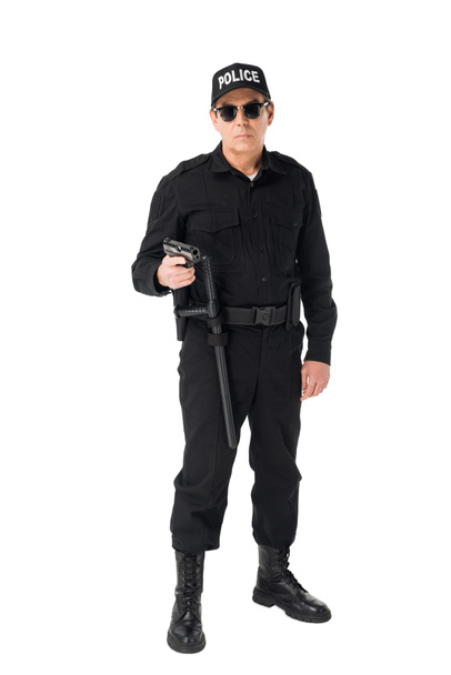 Serious policeman in sunglasses holding gun isolated on white - Φωτογραφία, εικόνα