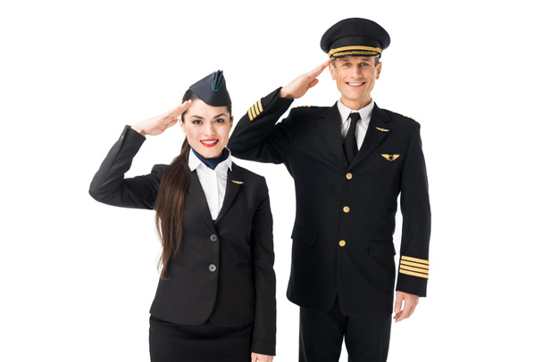Jeune hôtesse de l'air et pilote saluant isolé sur blanc
 - Photo, image