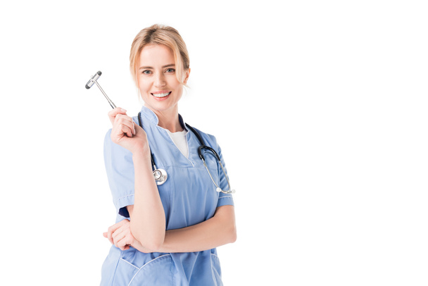 Enfermera en uniforme con martillo reflejo aislado en blanco
 - Foto, imagen