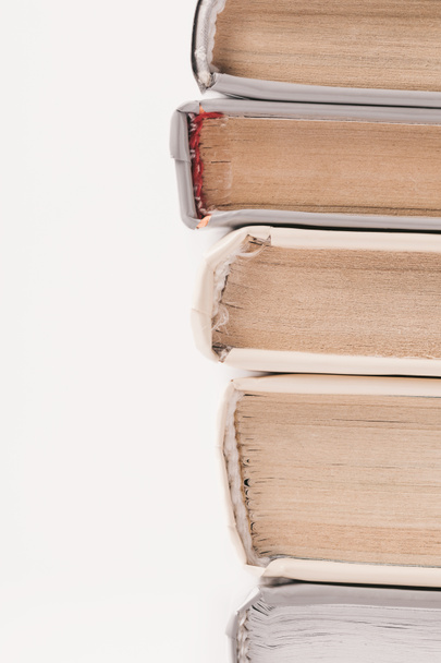 Обрезанное изображение стопки книг, изолированных на белом
 - Фото, изображение