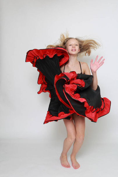 Studio image of flamenco dancer is jumping/Dancer in motion - Fotó, kép
