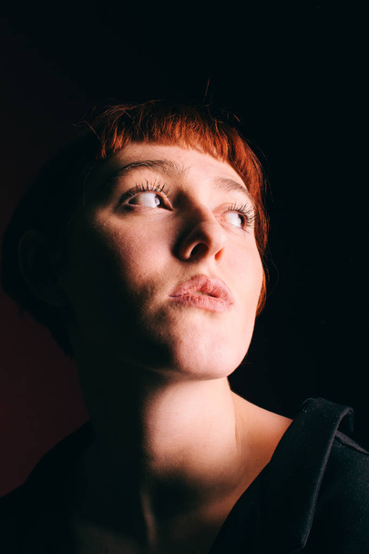 Beautiful girl freak with red hair and a short haircut - Fotografie, Obrázek