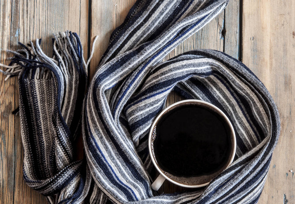 Cup with coffee and scarf - Фото, зображення
