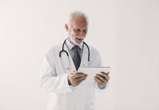 A Doctor Holding Tablet - Foto, Imagen