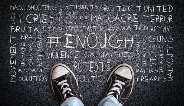 Teen Wearing Canvas Shoes on Asphalt With # Enough Word Cloud - Photo, Image