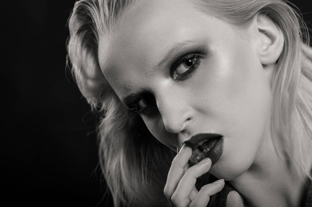 Beautiful sexy blonde woman on black background - Fotografie, Obrázek
