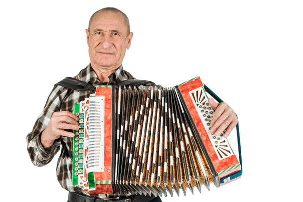 Retrato de un hombre, abuelo tocando el acordeón. Aislado sobre fondo blanco
. - Foto, imagen