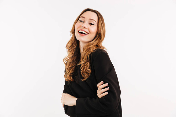 Portrait of a happy young woman dressed in black jacket - Fotografie, Obrázek