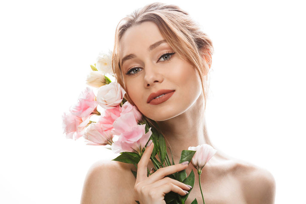 Elegant woman 20s with amazing makeup holding bunch of lovely te - Photo, image