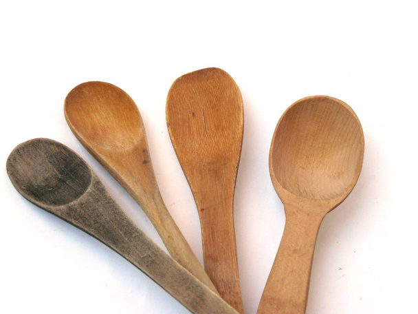 Kitchenware, wooden kitchen set, wooden spoon, kitchen spatula, utensils for cooking. Headstock stock image - Photo, Image