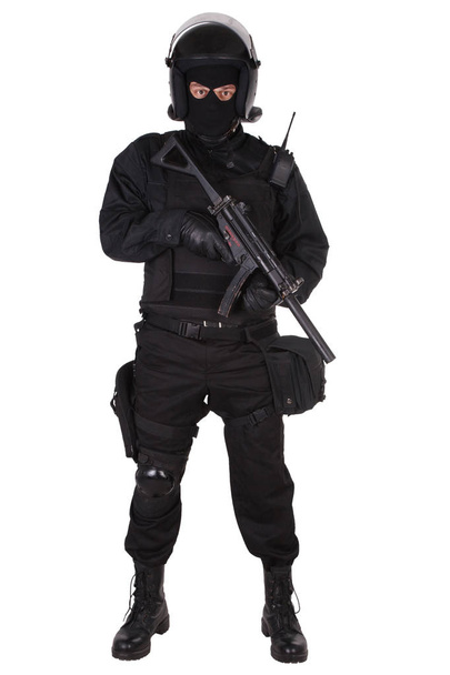 police special forces officer with submachine gun in black uniform - Photo, Image