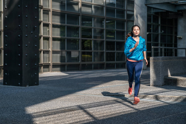 Woman city running, sunrise jogging concept. - Photo, Image