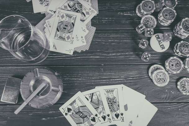 Whiskey, cards, cigarette background on the subject of poker - Photo, Image