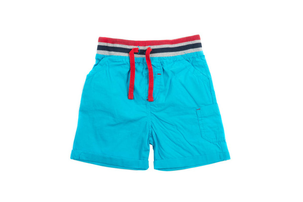 Blauwe shorts voor zwemmen voor mannen en kinderen, geïsoleerd op wit - Foto, afbeelding
