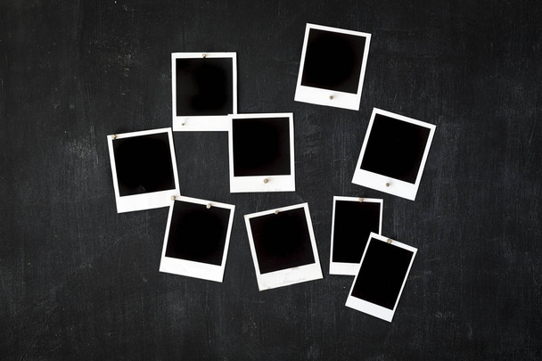 Blank retro photo frames attached to a metal blackboard with mag - Photo, Image
