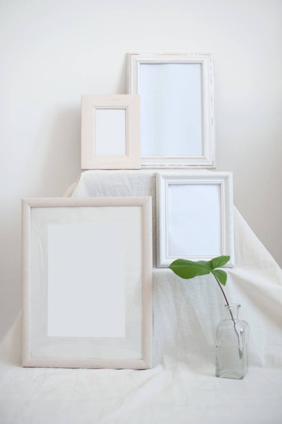 A few white wedding frames on a light background - Foto, Imagem