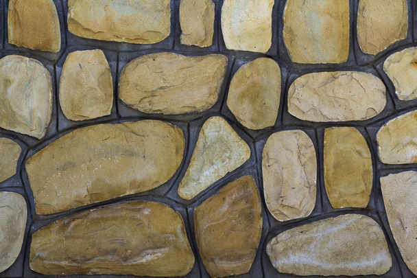 Diferentes tamanhos de pedras de areia. Parede de pedra fundo padrão
 - Foto, Imagem