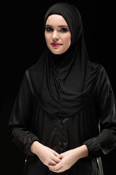 Portrait of young Muslim woman in traditional clothes - Photo, Image