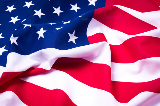 Pięknie falująca gwiazda i w paski amerykańska flaga. - Zdjęcie, obraz