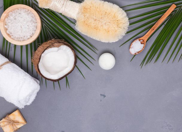 Coconut, brush and other spa related items, top view - Фото, изображение