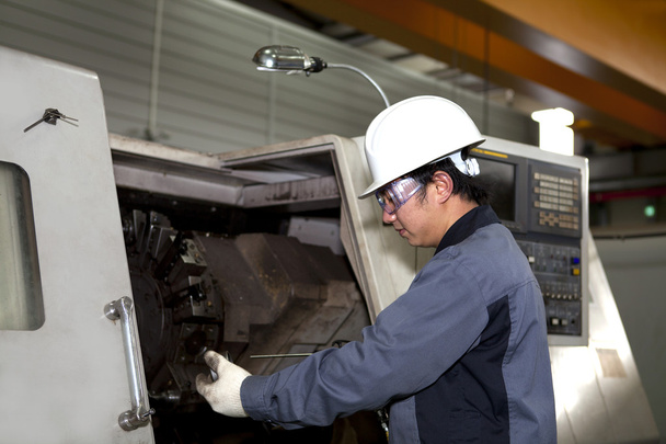 Mechanical technician of cnc machine - Photo, Image