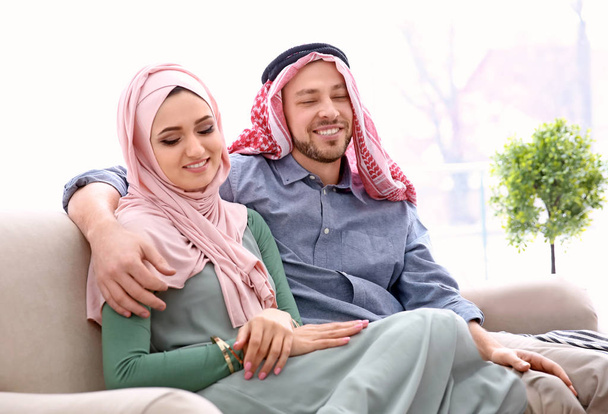 Happy Muslim couple at home - Photo, image