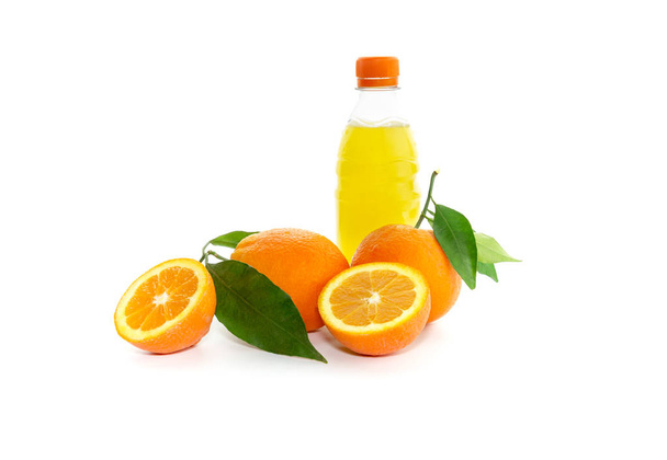 Bottle with a drink and oranges - Foto, immagini
