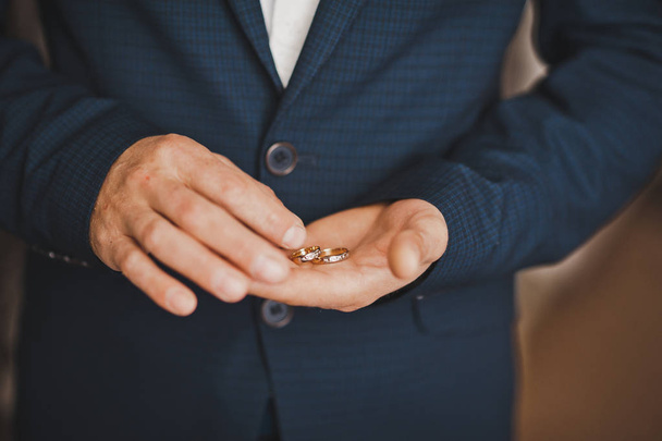 A large photo of male hands with wedding rings 793. - Foto, Imagem