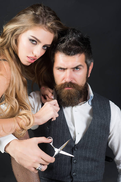 Bearded man and sexy woman with long curly hair. - Valokuva, kuva