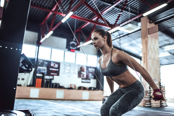 Sporty woman in gym - Foto, Imagen