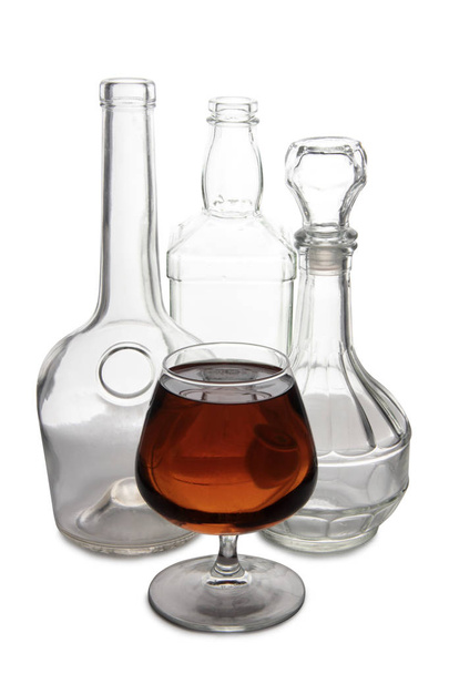 Glass with brandy and cognac on white background - Фото, зображення
