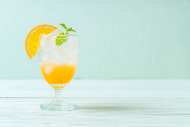orange juice with soda - Fotó, kép