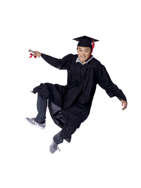 sonriente graduarse macho estudiante saltar
 - Foto, Imagen