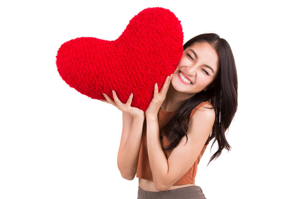 Asiático menina bonita e um coração vermelho
 - Foto, Imagem