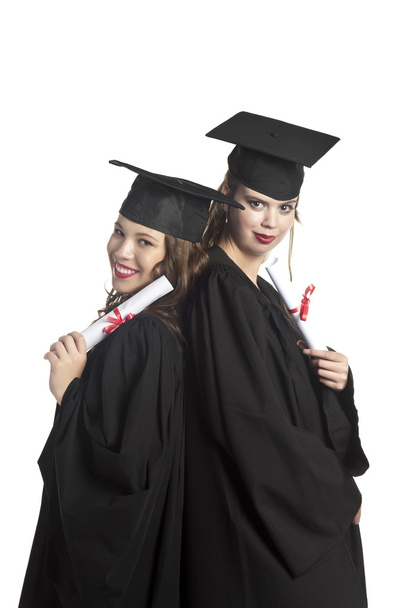 twee afstuderen studenten met hun diploma - Foto, afbeelding