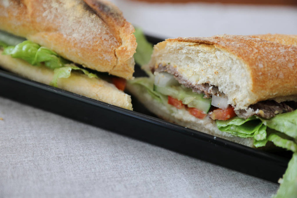 Beef sandwich on wood background - Photo, Image