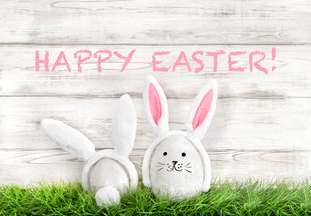 Easter eggs decoration Funny bunnies green grass - Фото, изображение