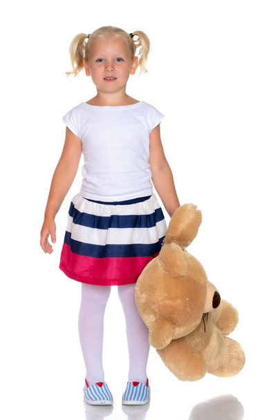 Little girl with teddy bear - 写真・画像