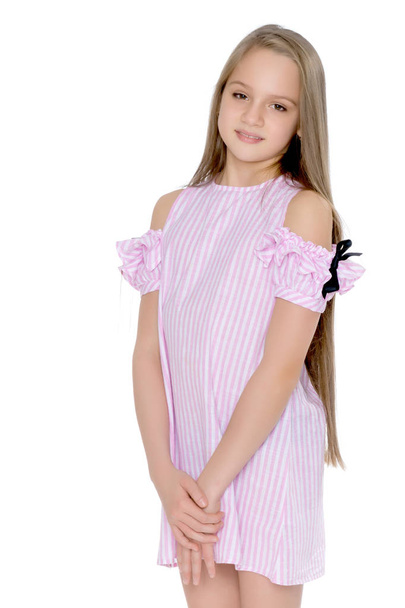 A teenage girl in a short dress. - Foto, Imagem