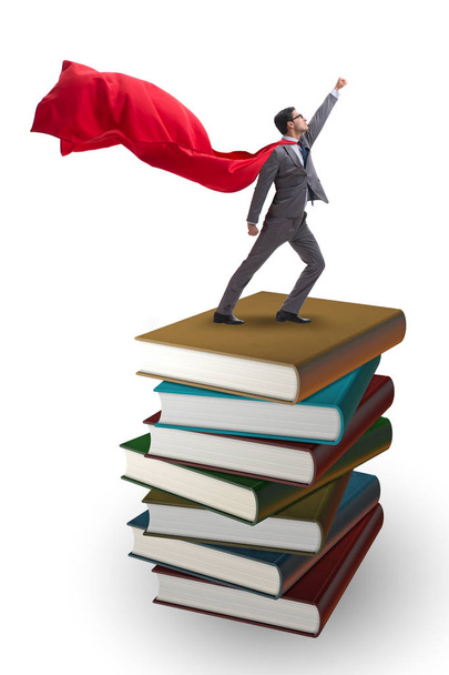 Superhero businessman  in education concept with books - Photo, Image