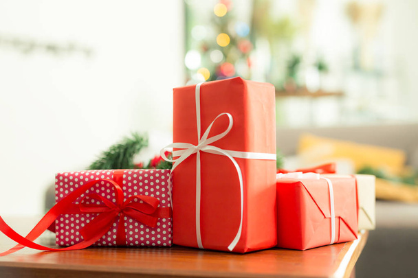 Handmade gift box placed on a wooden table,Christmas concept - 写真・画像